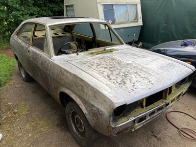 Old Morris Marina car stripped without windscreen
