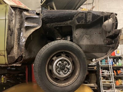 Bodywork of a Morris Marina is repaired