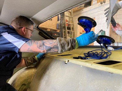 Dean Proctor fitting a rear screen